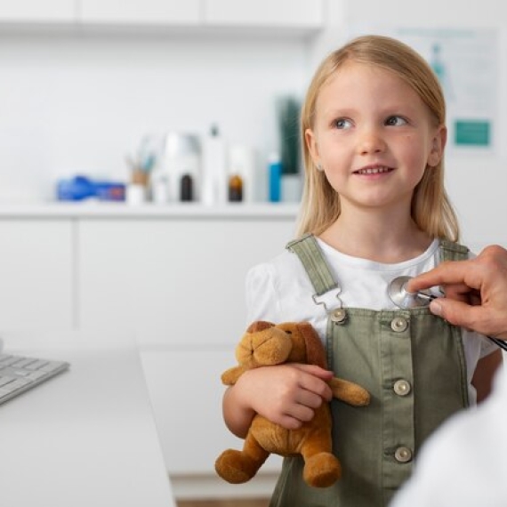 young-girl-pediatrician-consultation-with-her-doctor_23-2149187501